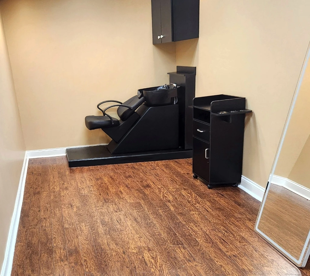 Private salon suite with custom shampoo station setup